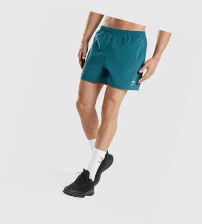 Bermudas Gymshark Arrival 5" Hombre Turquesa | UDAKBFZ-09