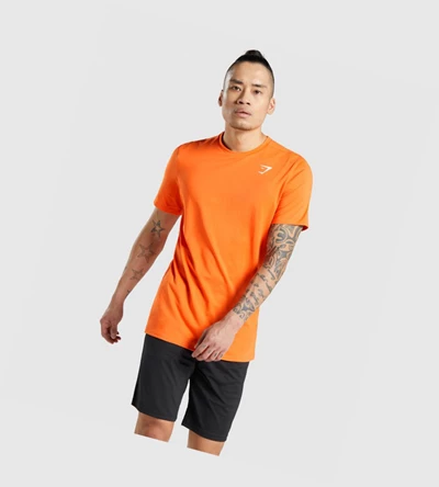 Camiseta Gymshark Arrival Hombre Naranjas | UKQBRFE-60