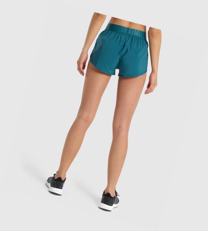 Bermudas Gymshark Entrenamiento Loose Fit Mujer Turquesa | IHDJKRB-07