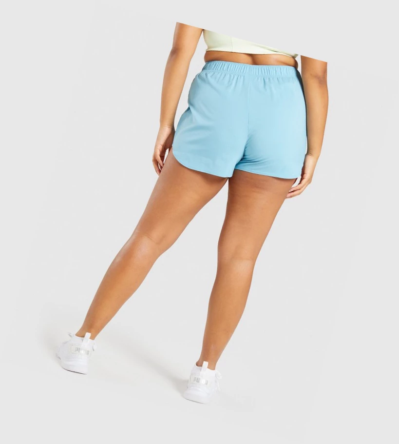 Bermudas Gymshark Essential Loose Entrenamiento Mujer Azules Claro | WIPYKSA-24