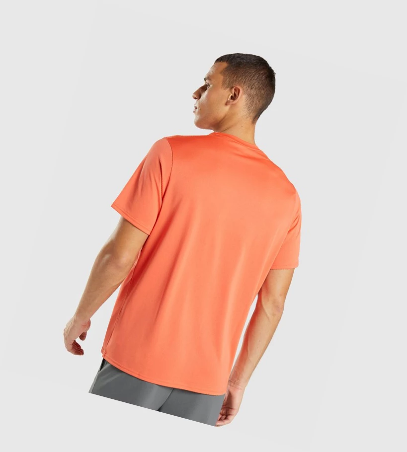 Camiseta Gymshark Arrival Regular Fit Hombre Naranjas | DZXKMRQ-17