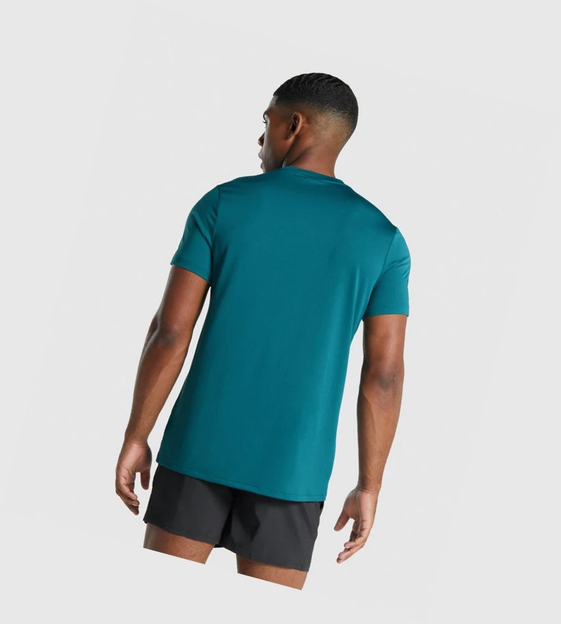 Camiseta Gymshark Arrival Regular Fit Hombre Turquesa | EJQSGXZ-39