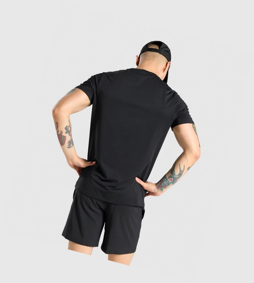 Camiseta Gymshark Arrival Regular Fit Hombre Negros | KHTWCSI-67